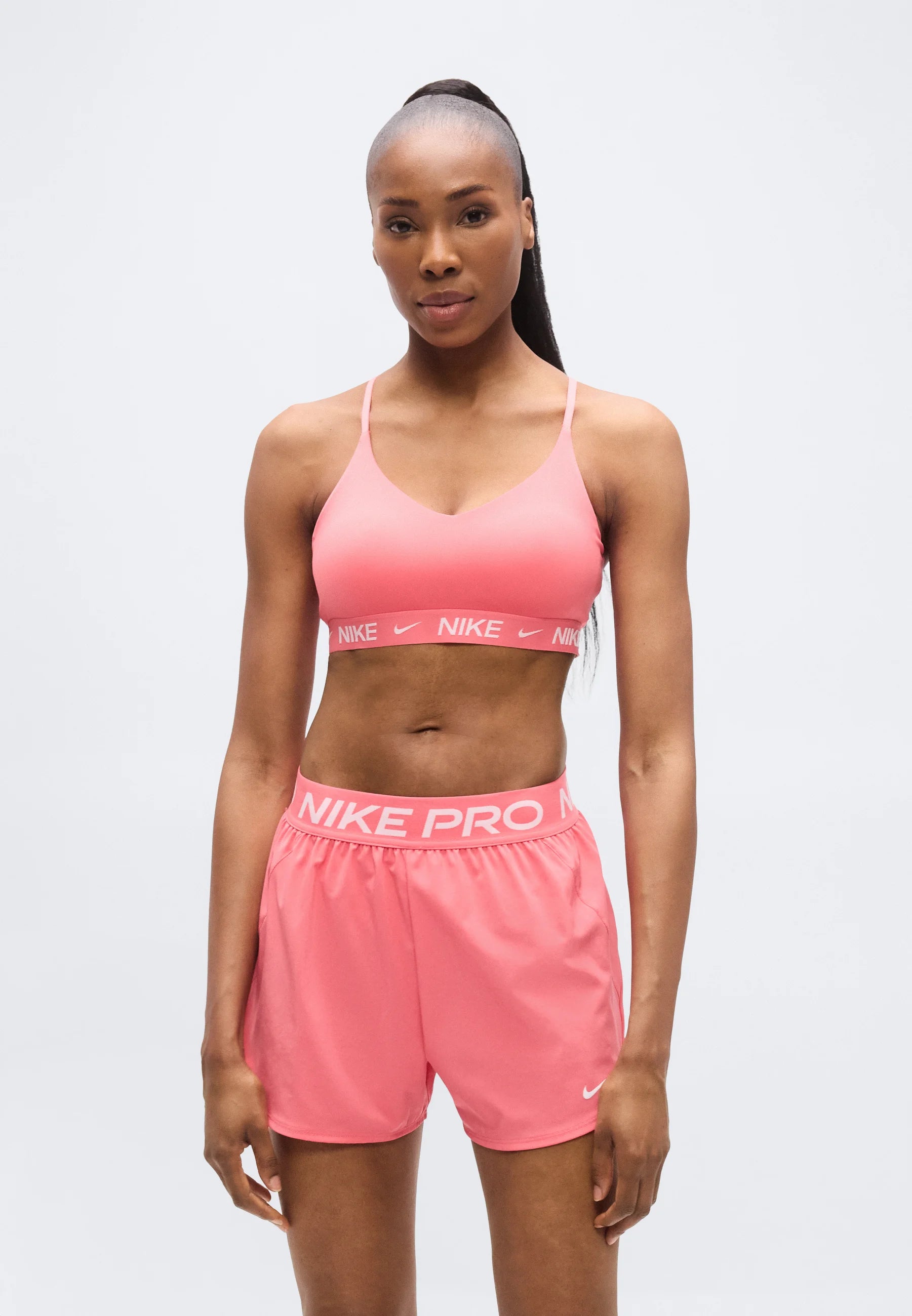Nike Performance Indy Light Stütz-BH – Meereskoralle, Weiß