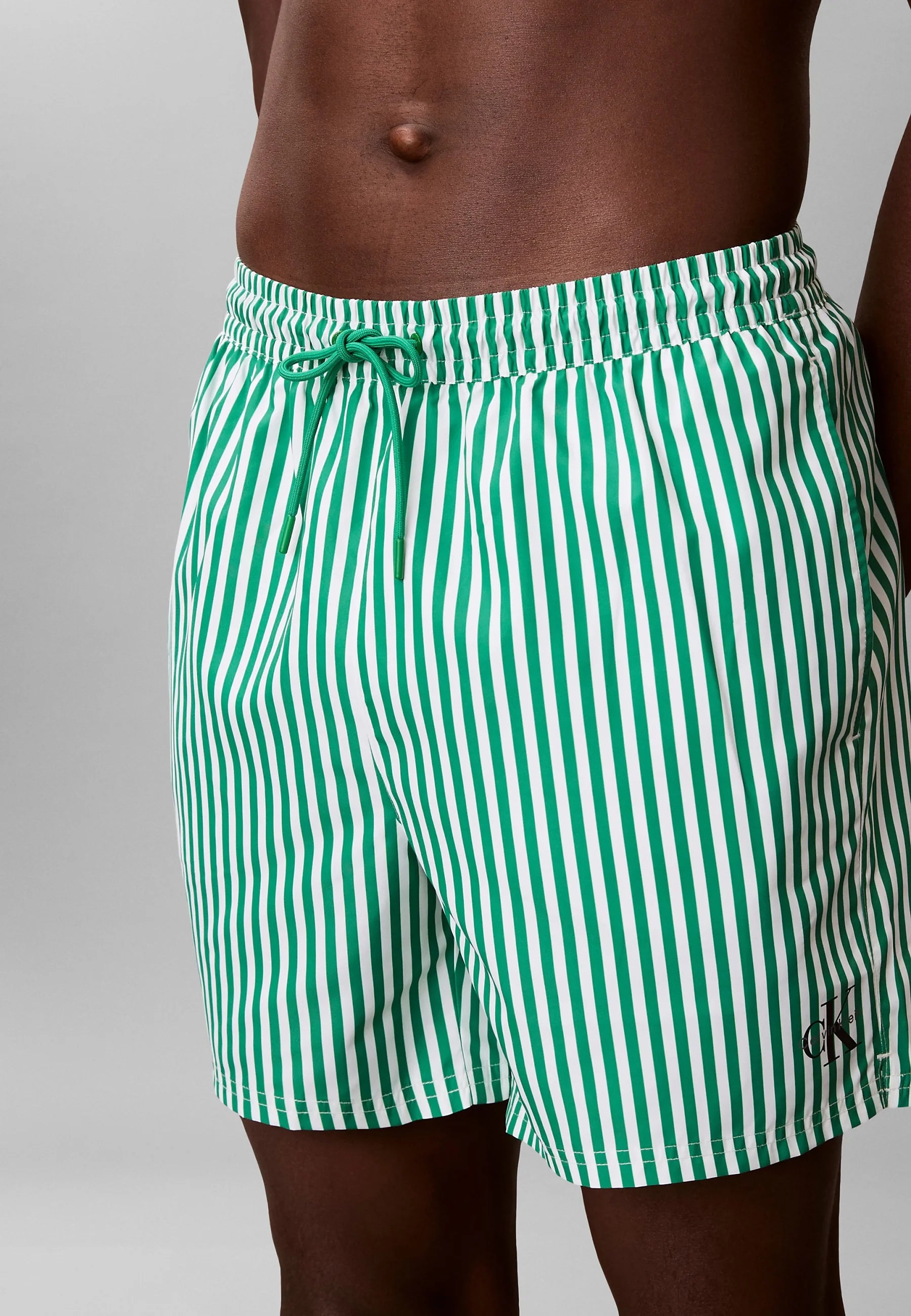 Calvin Klein Graphic Swim Shorts – Penny Stripe, Mardi Gras Green