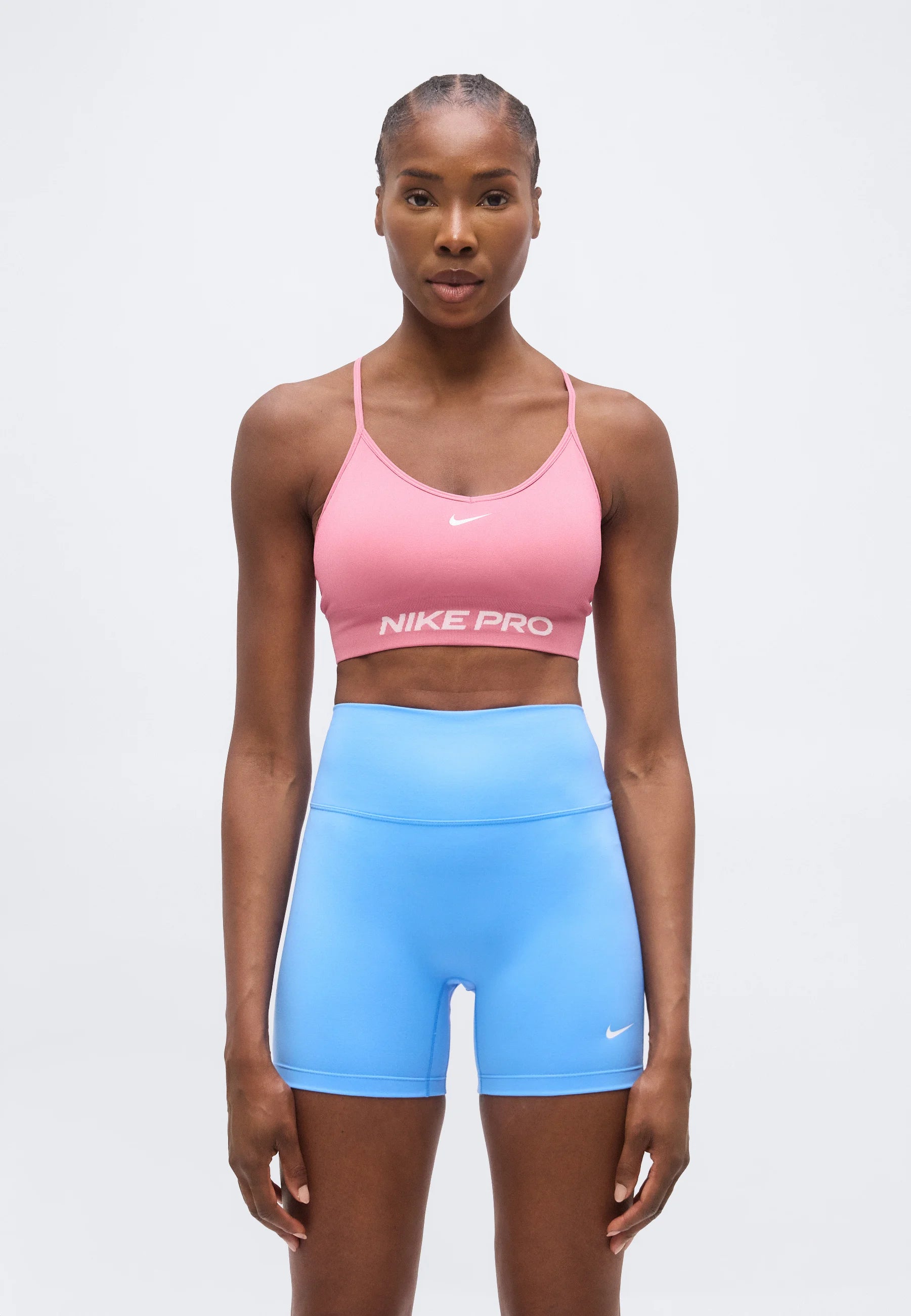 Podprsenka Nike Performance Light Support – pivoňka, bílá