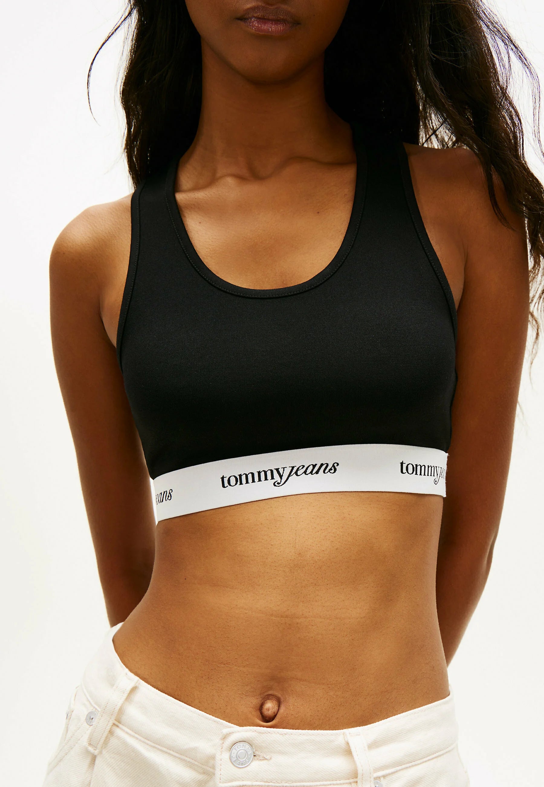 Měkká podprsenka Tommy Jeans Repeat Logo Racerback – černá