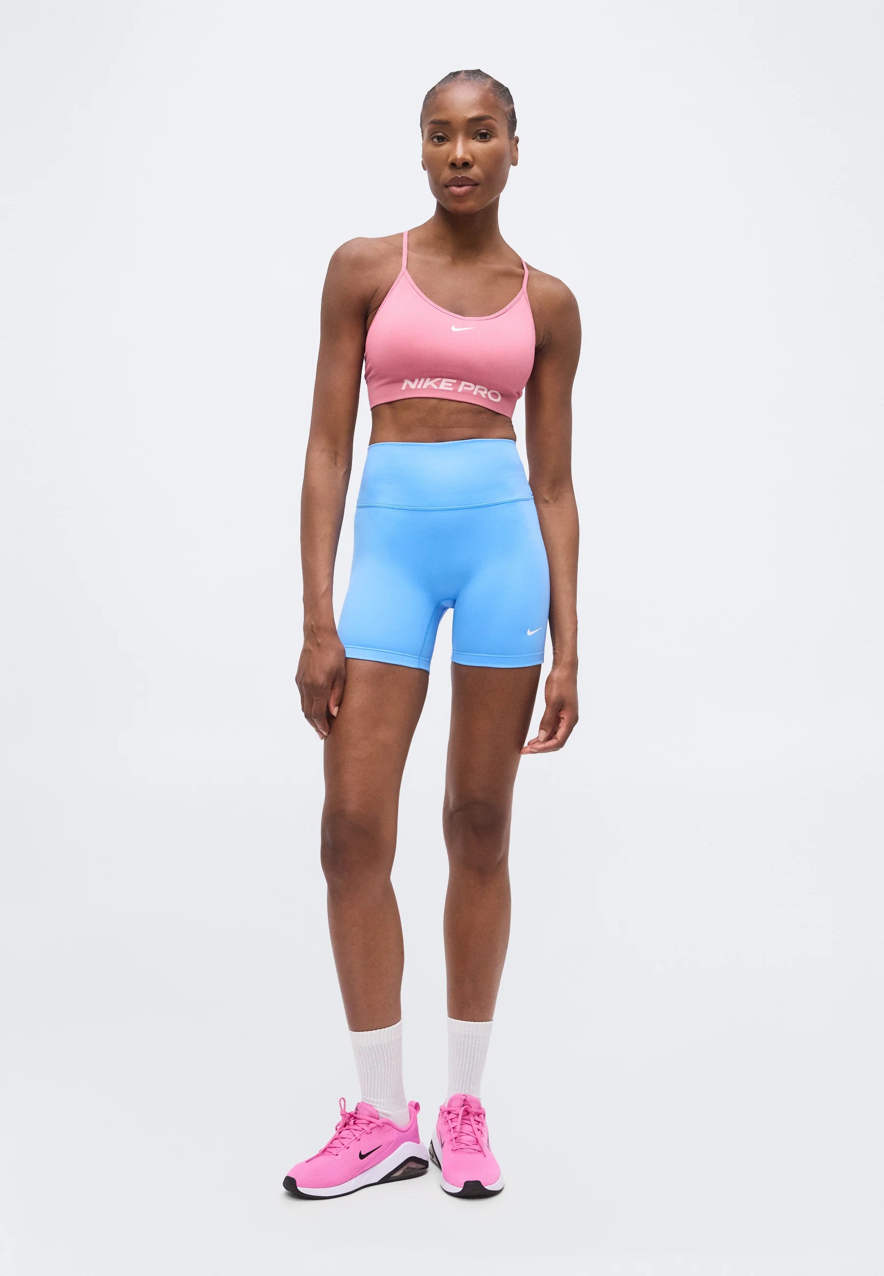Podprsenka Nike Performance Light Support – pivoňka, bílá