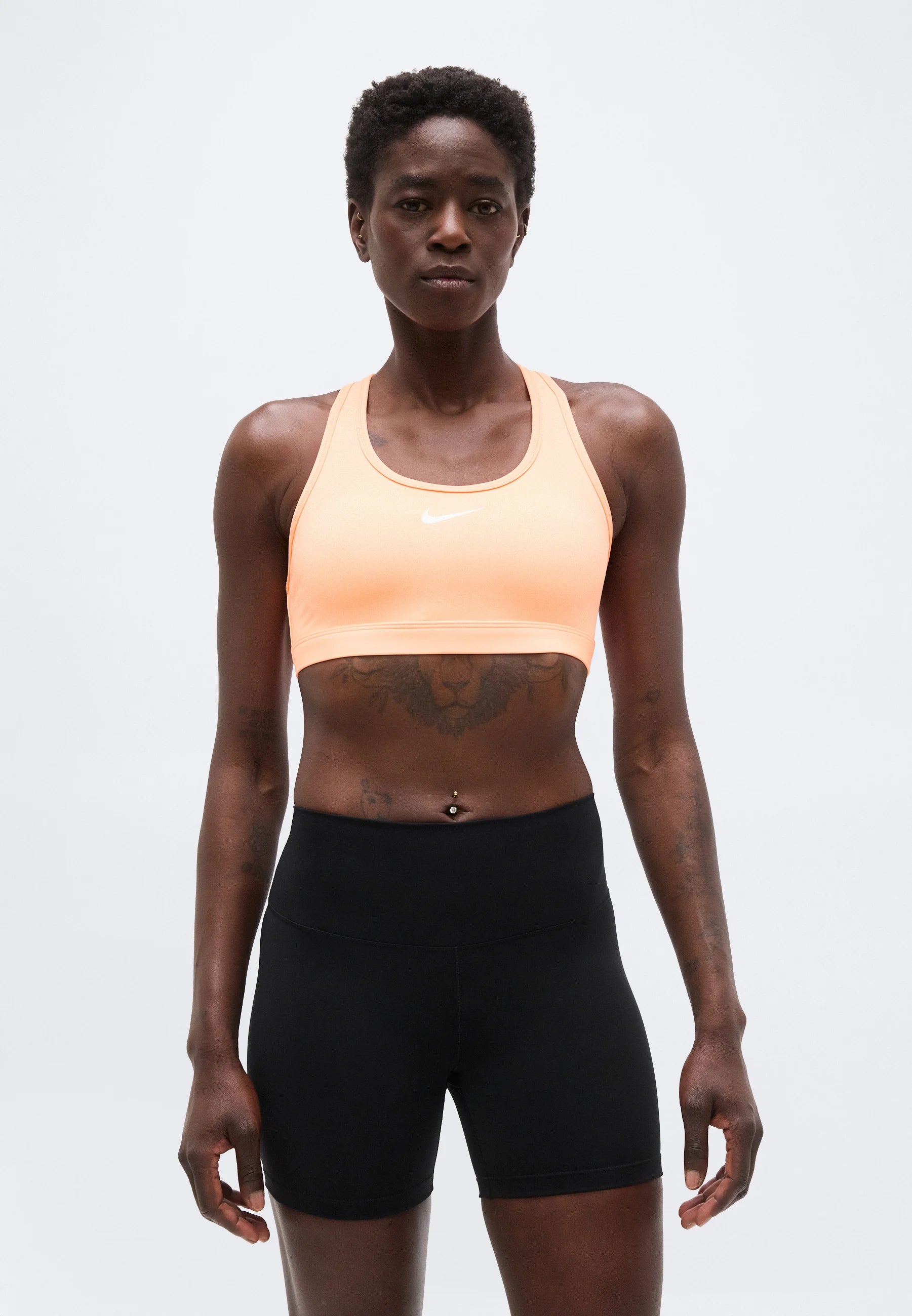 Sportovní podprsenka Nike Medium Support – oranžová Pulse, bílá